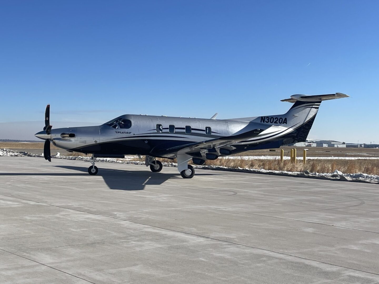 A small airplane sitting on top of an airport runway.